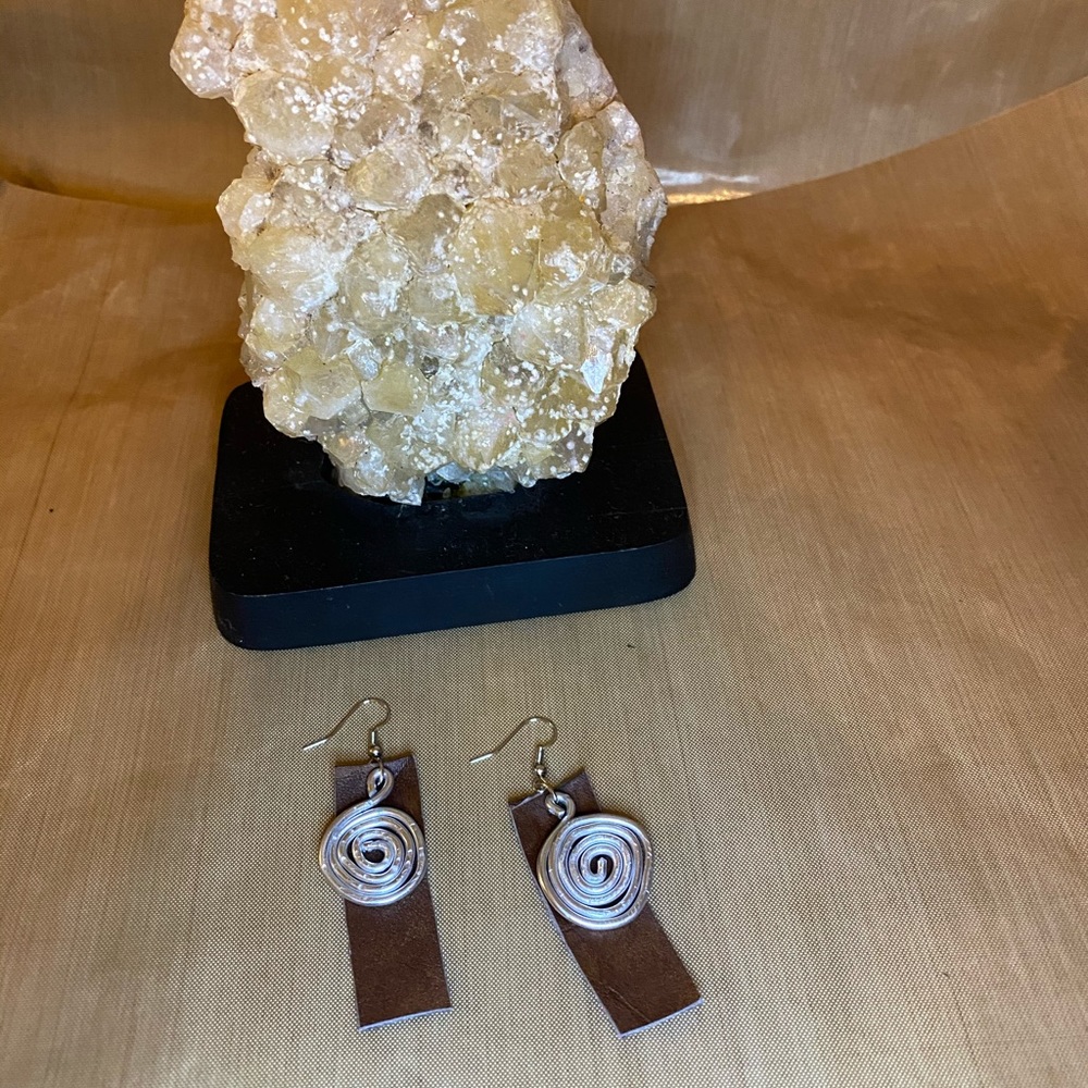 Leather up cycle earrings.